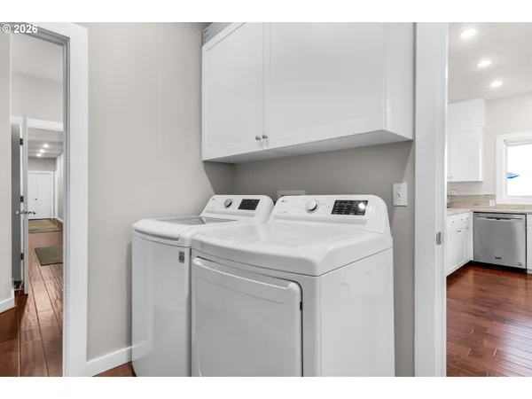 a utility room with dryer and washer