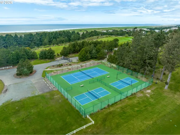 a view of a big room with pool yard and outdoor seating