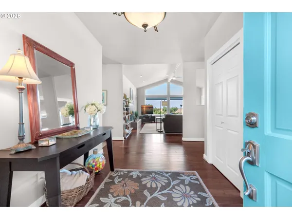 a living room with furniture and a table