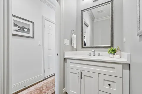 a utility room with sink dryer and washer
