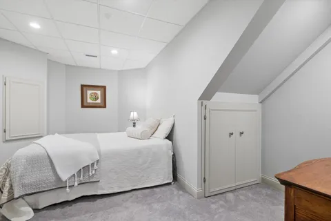 a front view of a house with large windows