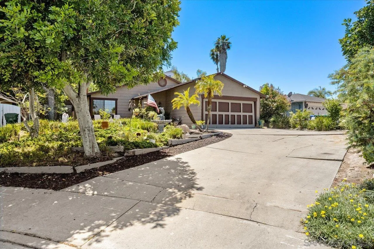2337 Fallingleaf Road Oceanside, CA 92056 - Photo 27 of 34 a front view of a house with a yard