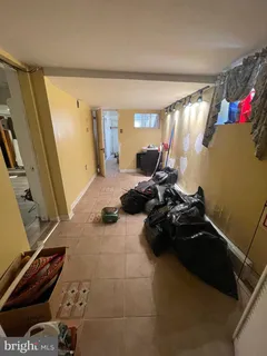 a room with furniture and a flat screen tv