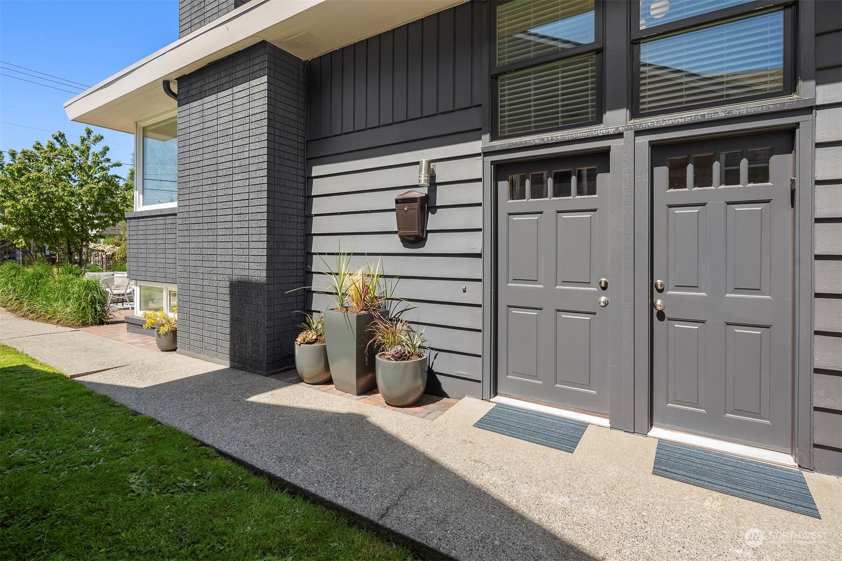 3226 60th Avenue Southwest Seattle, WA 98116 - Photo 2 of 34 a house view with a outdoor space