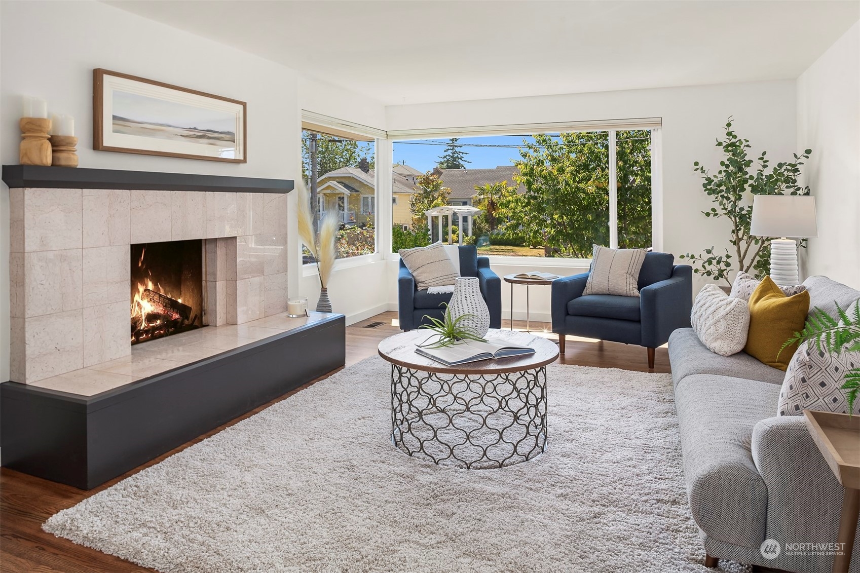 3226 60th Avenue Southwest Seattle, WA 98116 - Photo 6 of 34 a living room with furniture and a fireplace