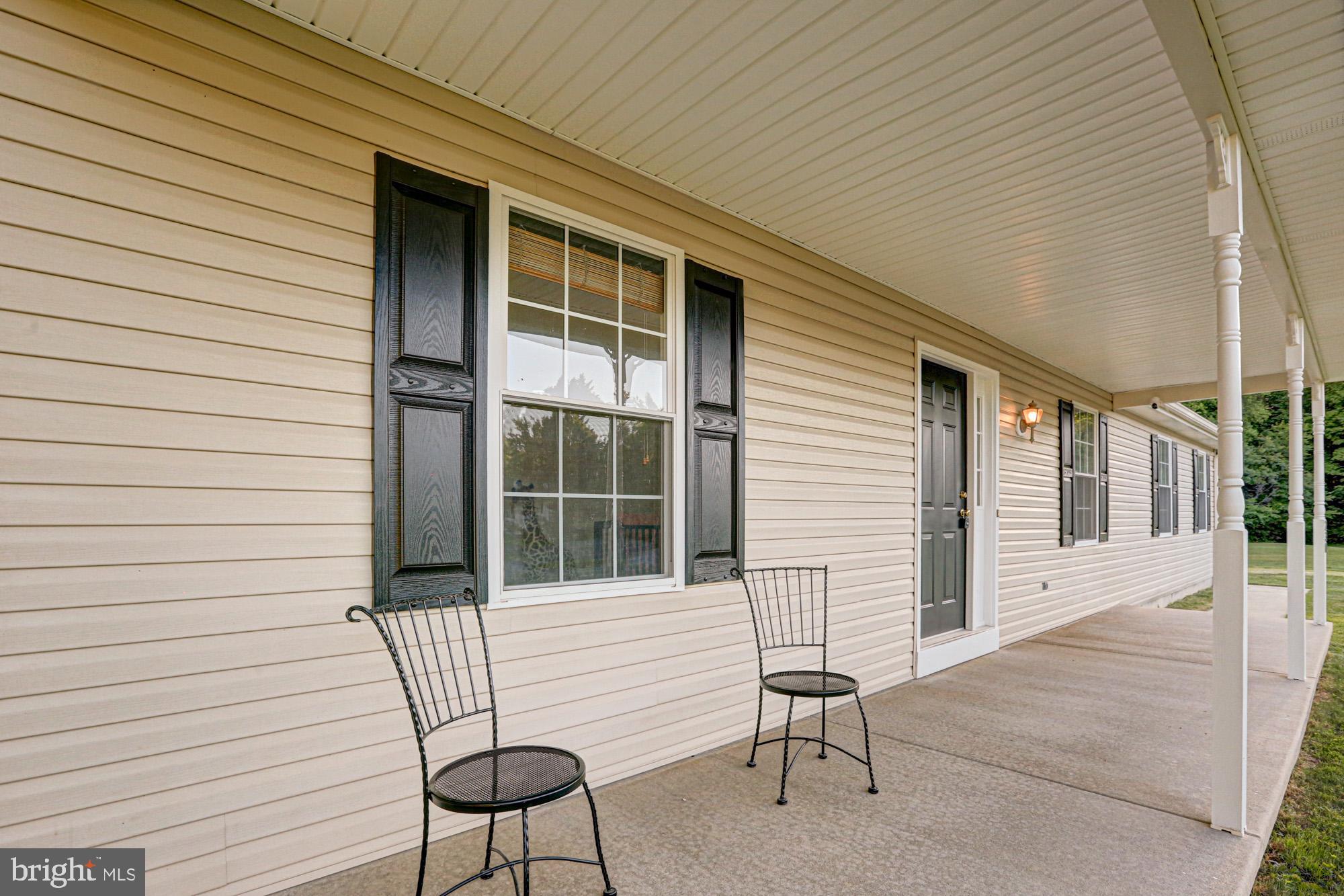 230 Tina Marie Lane Smyrna, DE 19977 - Photo 12 of 83 a view of a house with a patio