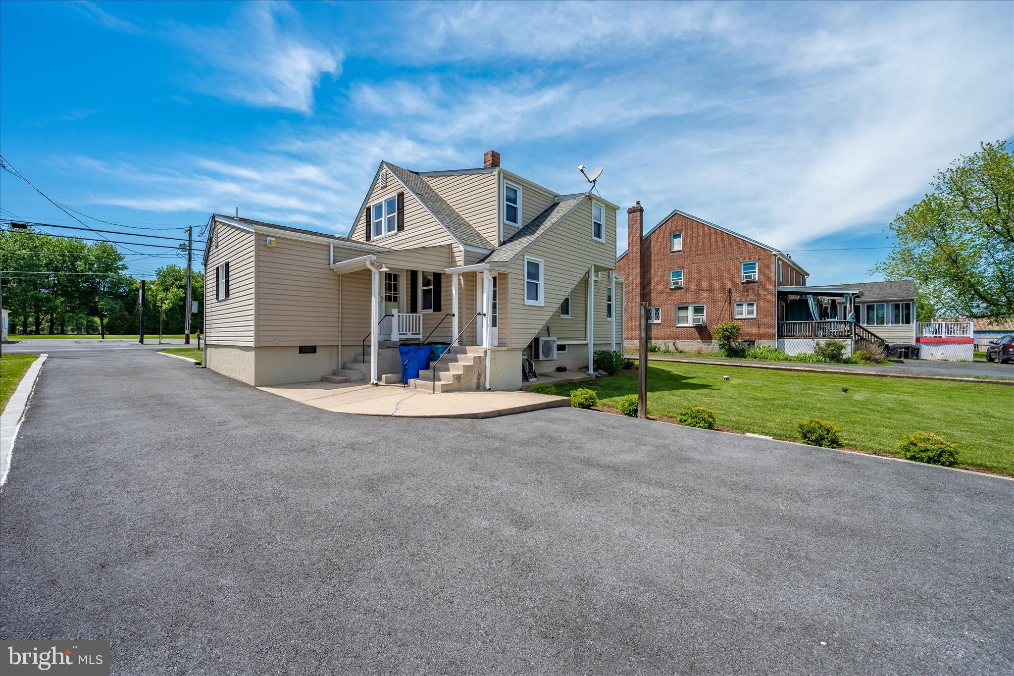 11205 Hessong Bridge Road Thurmont, MD 21788 - Photo 49 of 69 a view of a big house with a big yard and large trees