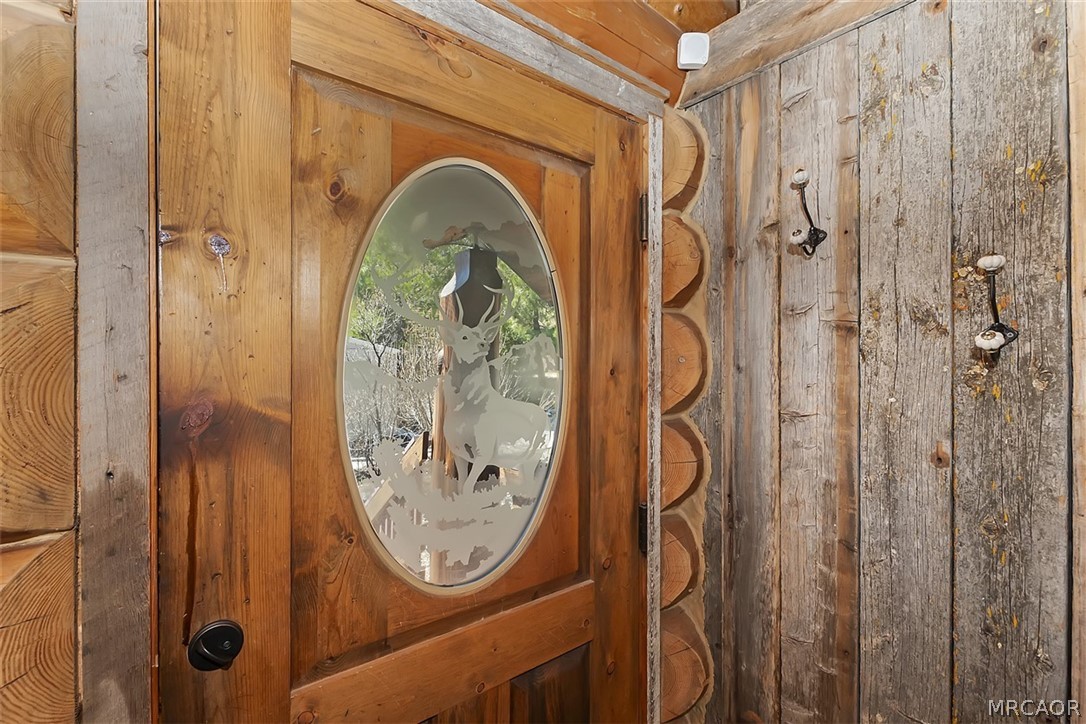 29632 Hook Creek Road Cedar Glen, CA 92321 - Photo 30 of 43 a bathroom with a granite countertop shower and a mirror