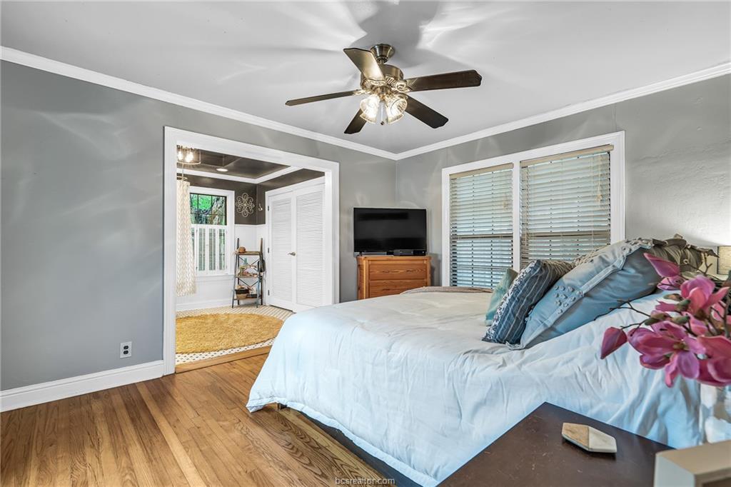 1414 East 29th Street Bryan, TX 77802 - Photo 13 of 21 a bed room with a bed and a window
