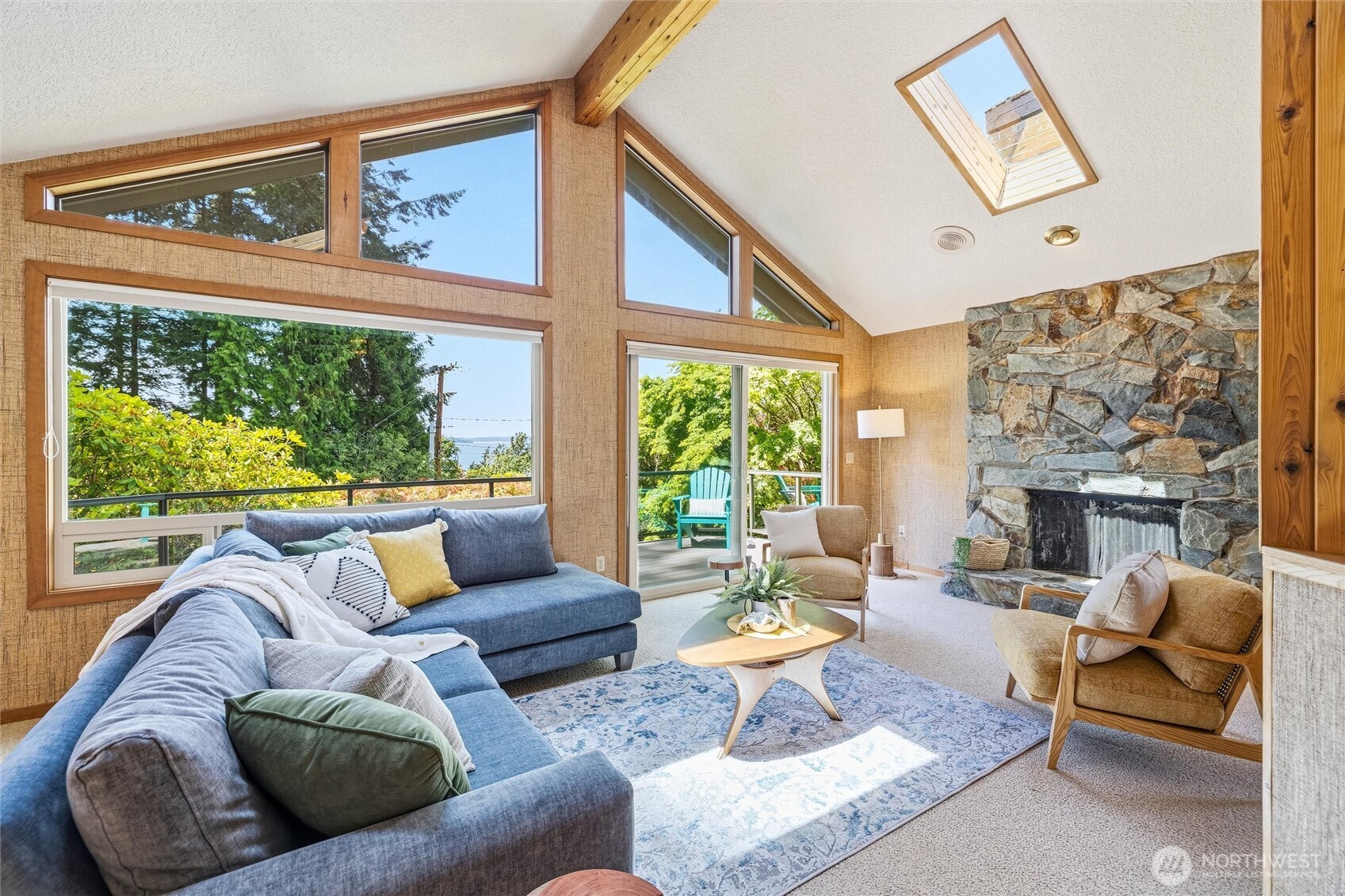 601 Clark Road Bellingham, WA 98225 - Photo 3 of 38 a living room with fireplace furniture and a large window