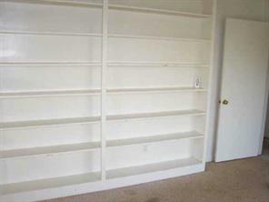 525 Murdock Road Troutman, NC 28166 - Photo 4 of 5 a view of an empty walk in closet