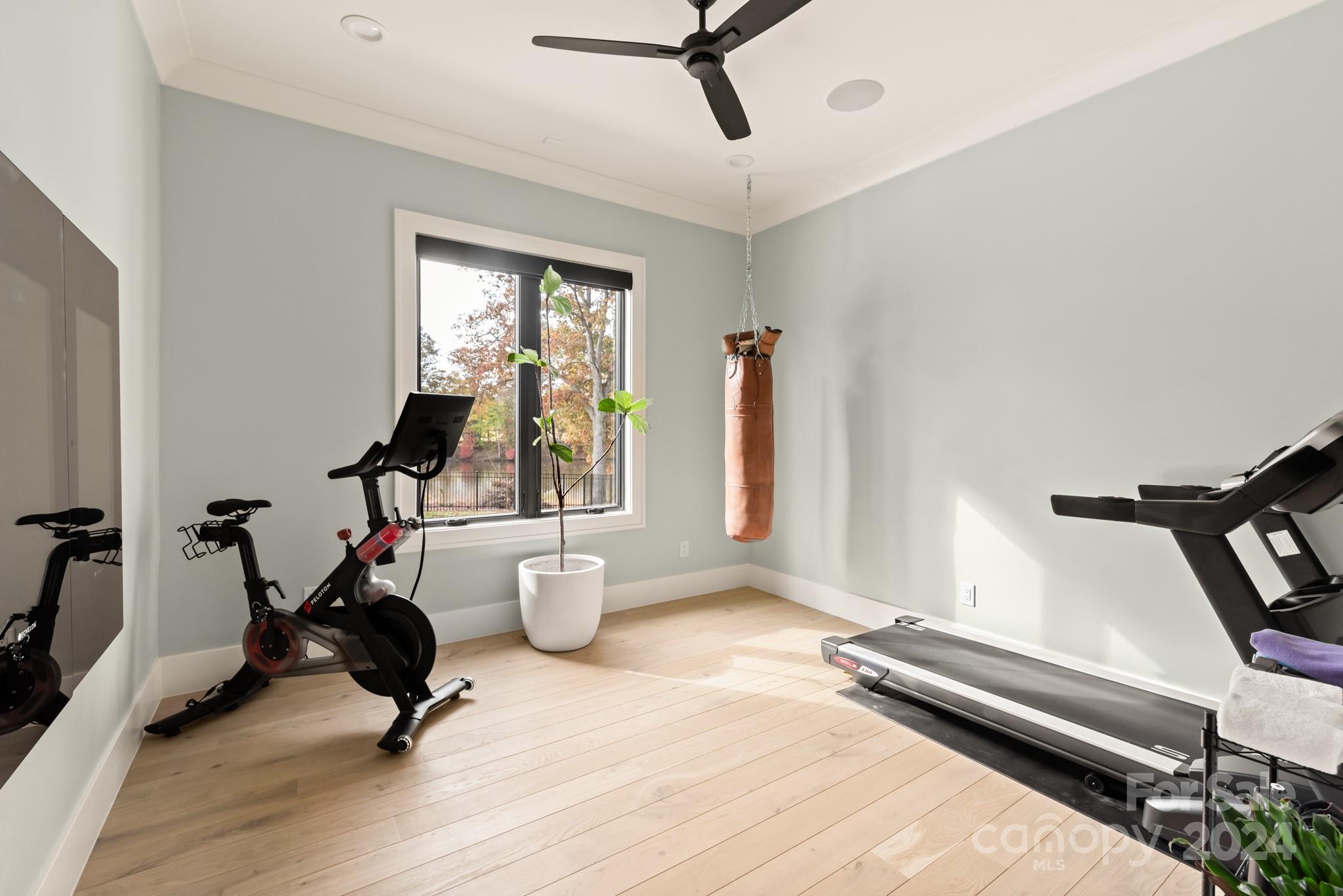 1017 Maxwell Court, Unit 5 Marvin, NC 28173 - Photo 17 of 26 a view of a room with gym equipment