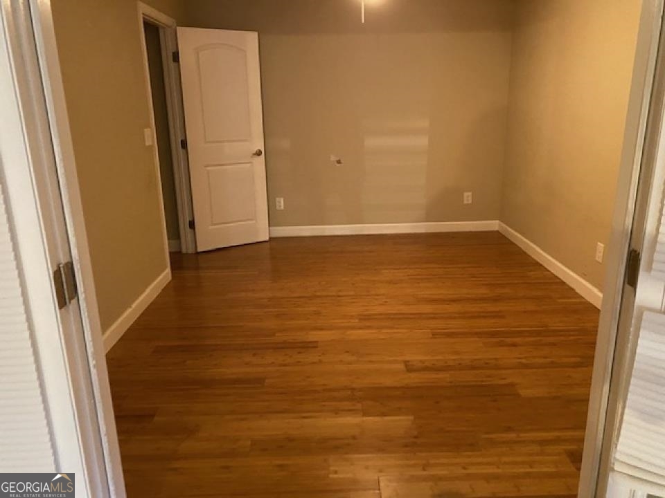 1193 Clifton Road Atlanta, GA 30307 - Photo 18 of 31 a view of room with wooden floor
