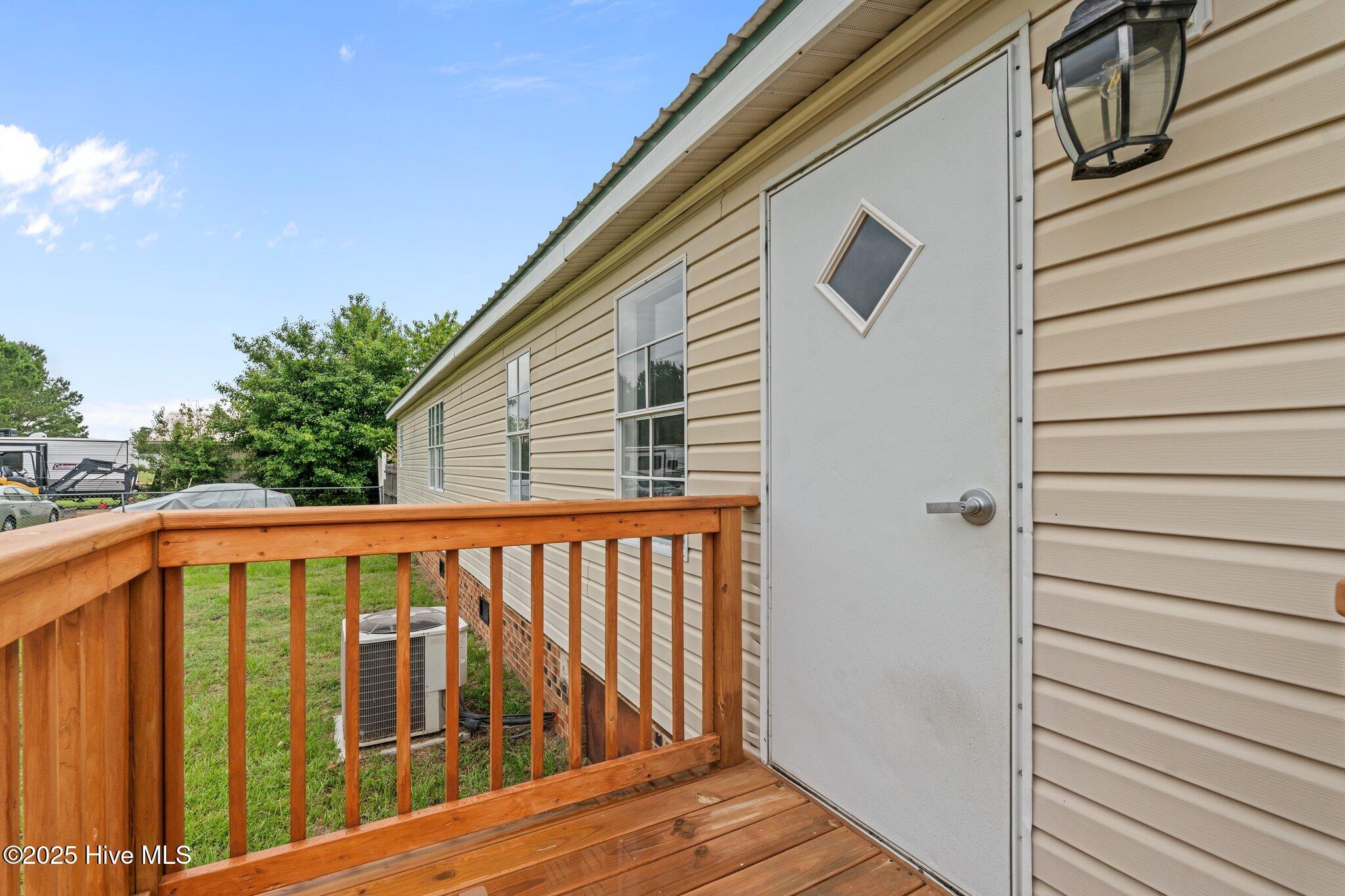 4780 Lobelia Road Vass, NC 28394 - Photo 52 of 55 Deck and backdoor