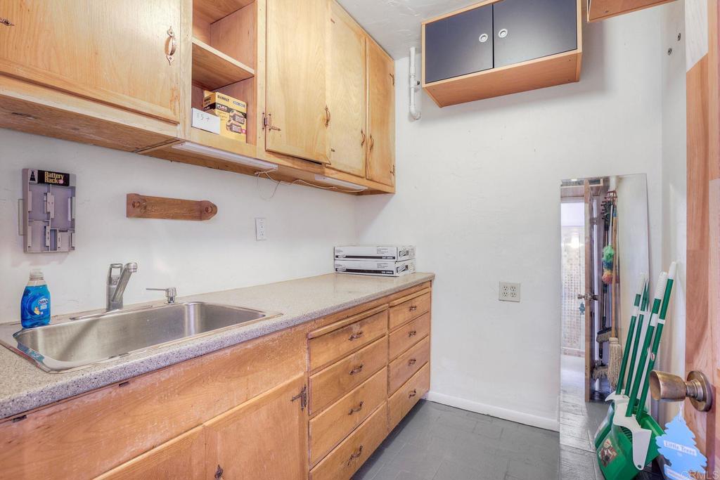 22223 Crestline Road Palomar Mountain, CA 92060 - Photo 41 of 90 a kitchen with stainless steel appliances granite countertop a sink a stove and a microwave oven