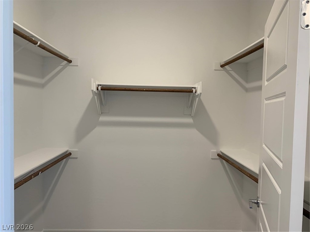 2555 Hampton Road, Unit 7109 Henderson, NV 89052 - Photo 20 of 34 Ample hanging space and shelving create an organized wardrobe solution.