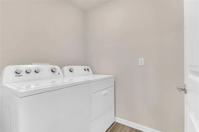 a utility room with dryer and washer
