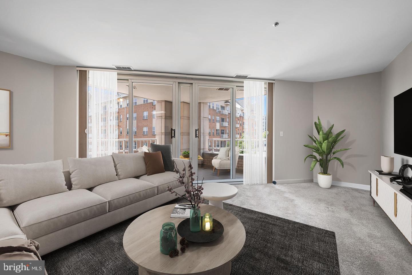 100 Harborview Drive, Unit 212 Baltimore, MD 21230 - Photo 1 of 29 a living room with furniture and a large window