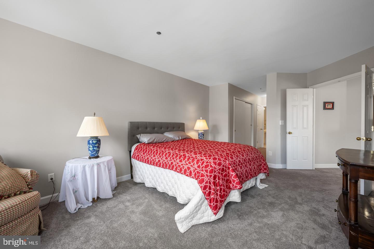 100 Harborview Drive, Unit 212 Baltimore, MD 21230 - Photo 18 of 29 a bedroom with bed and window