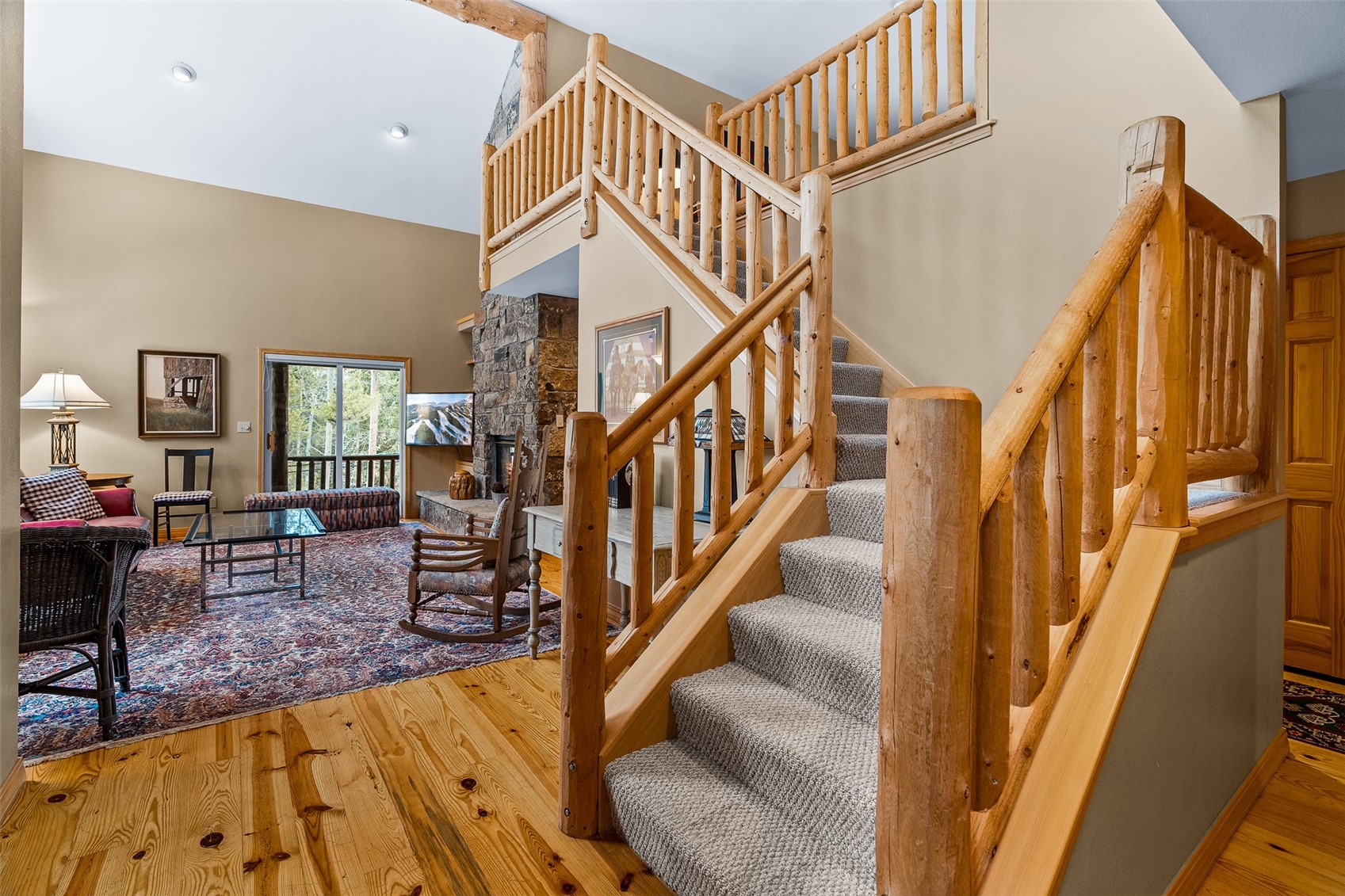 696 Moonstone Road Breckenridge, CO 80424 - Photo 13 of 34 a view of entryway livingroom and hall with wooden floor