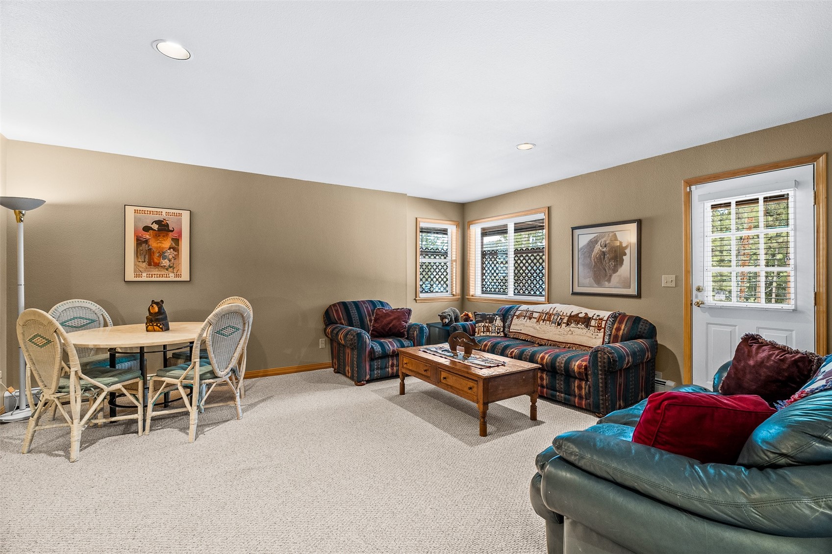 696 Moonstone Road Breckenridge, CO 80424 - Photo 24 of 34 a living room with furniture and a large window