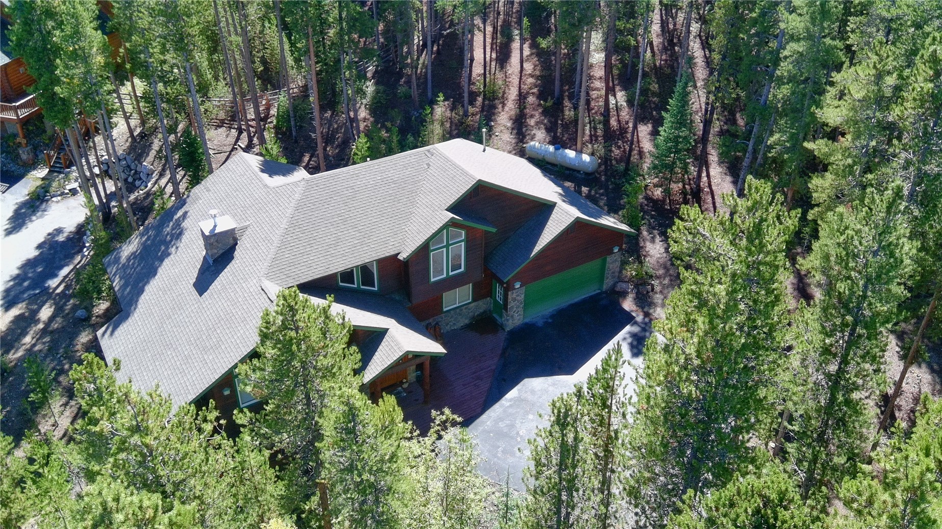 696 Moonstone Road Breckenridge, CO 80424 - Photo 32 of 34 an aerial view of a house with a yard swimming pool and