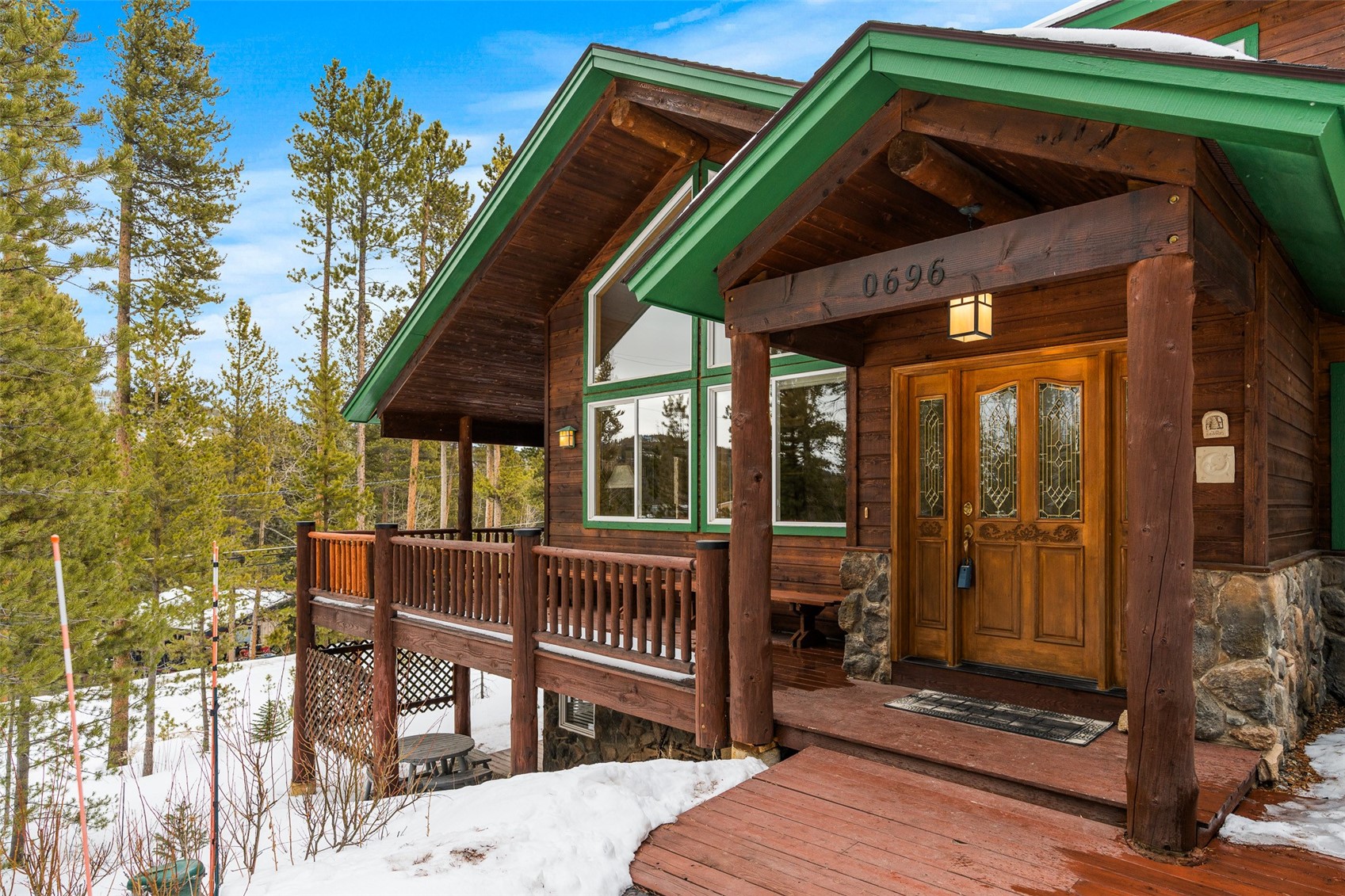 696 Moonstone Road Breckenridge, CO 80424 - Photo 6 of 34 a view of wooden house with a large window