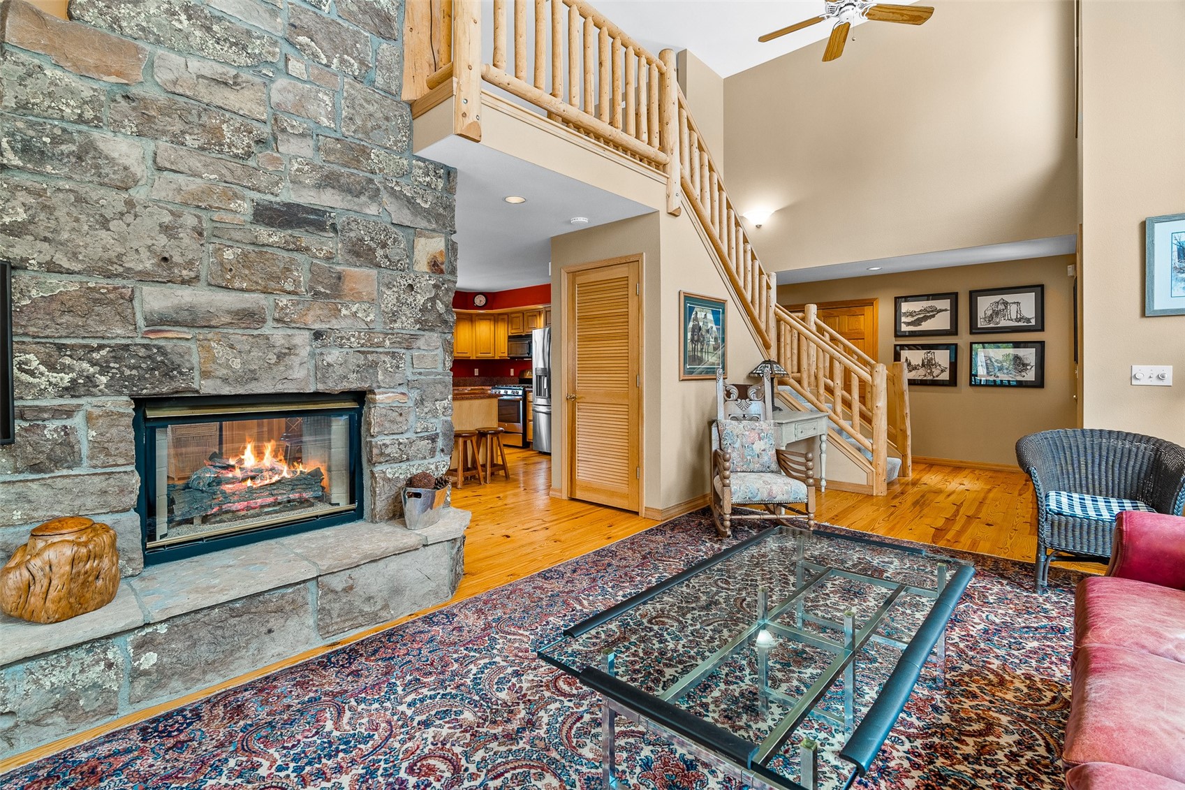 696 Moonstone Road Breckenridge, CO 80424 - Photo 8 of 34 a living room with furniture and a fireplace