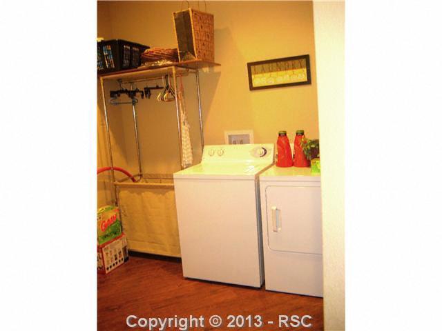 576 Ute Road Westcliffe, CO 81252 - Photo 25 of 25 LARGE LAUNDRY ROOM COMPLLETE WITH WASHER, DRYER AND DEEP SINK.