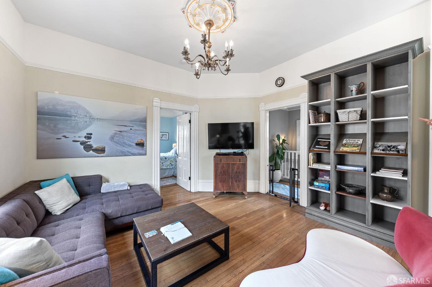 1918 Broadway Alameda, CA 94501 - Photo 11 of 28 a living room with furniture and a flat screen tv