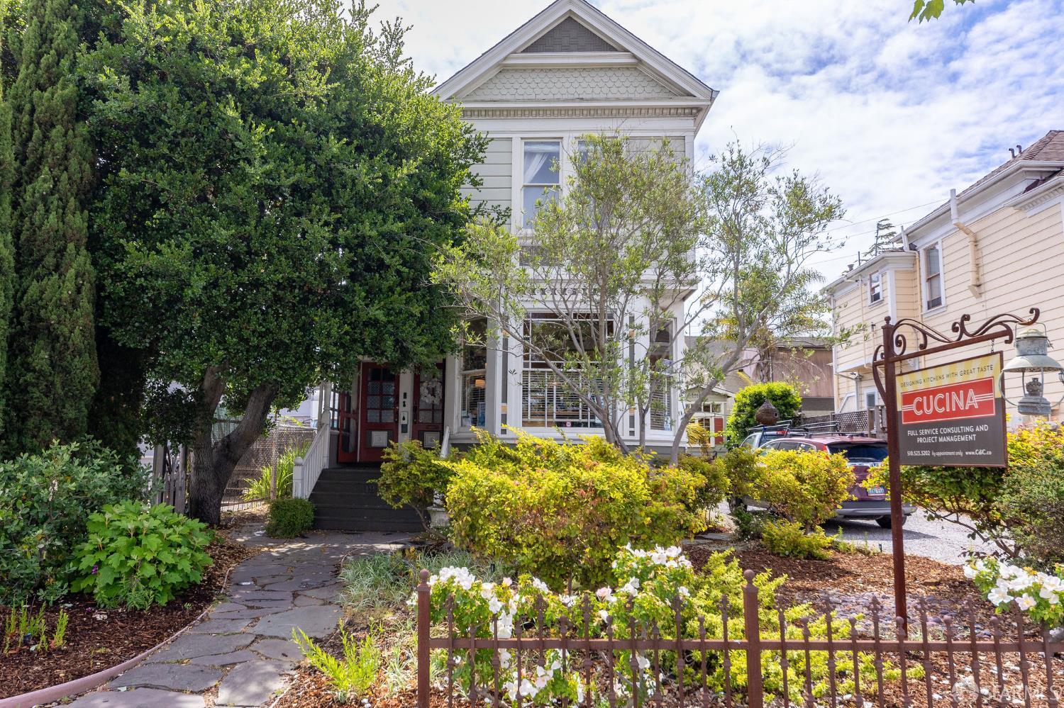 1918 Broadway Alameda, CA 94501 - Photo 3 of 28 a front view of a house with garden