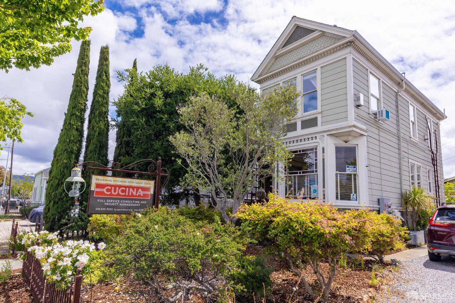 1918 Broadway Alameda, CA 94501 - Photo 4 of 28 a view of a building with a garden