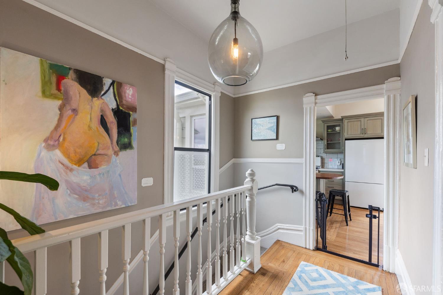 1918 Broadway Alameda, CA 94501 - Photo 6 of 28 a view of a hallway with entryway and chandelier