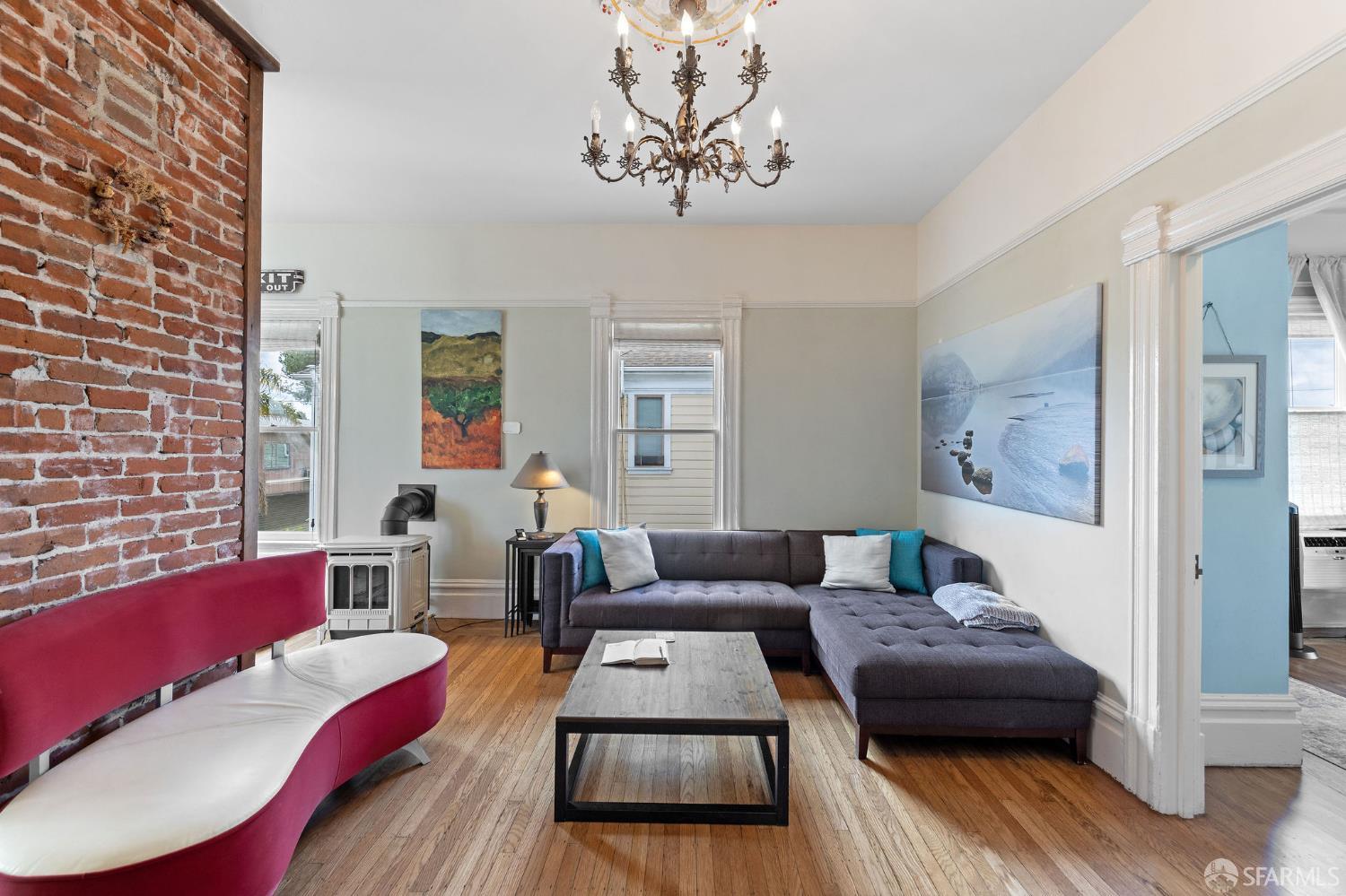 1918 Broadway Alameda, CA 94501 - Photo 8 of 28 a living room with furniture and a couch