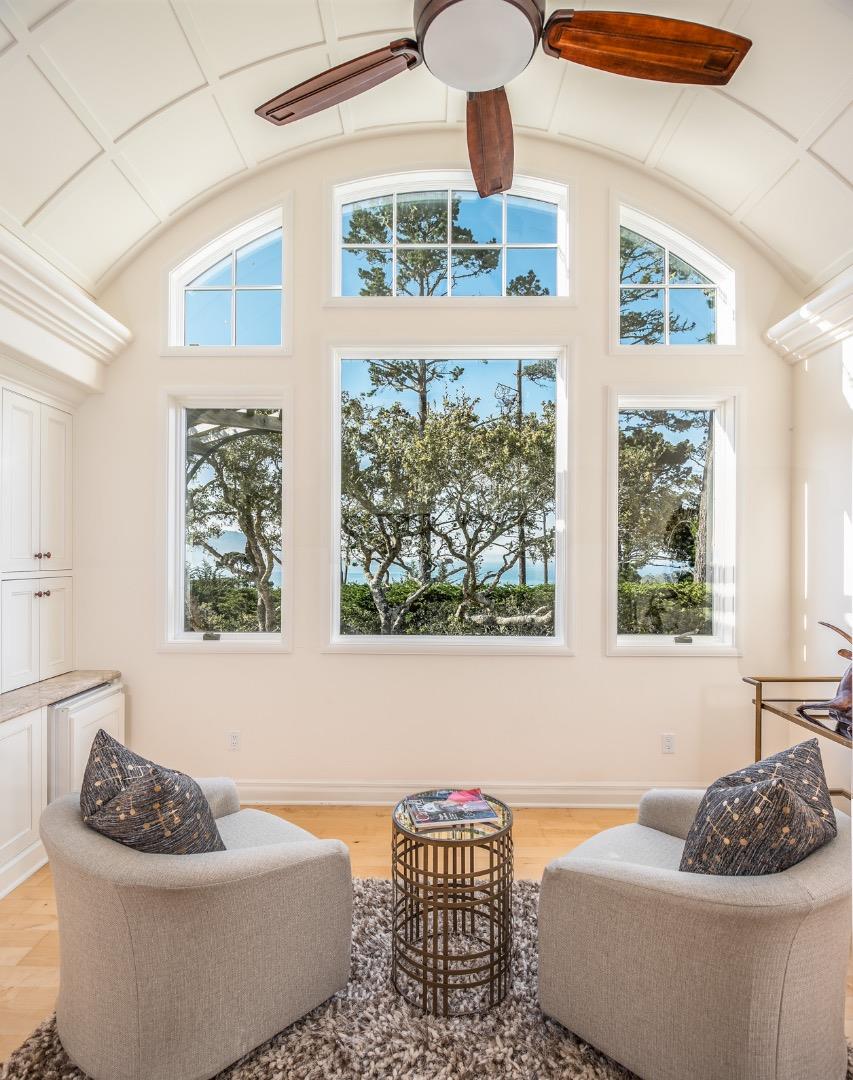 1465 Oleada Road Pebble Beach, CA 93953 - Photo 11 of 30 a living room with furniture and a window