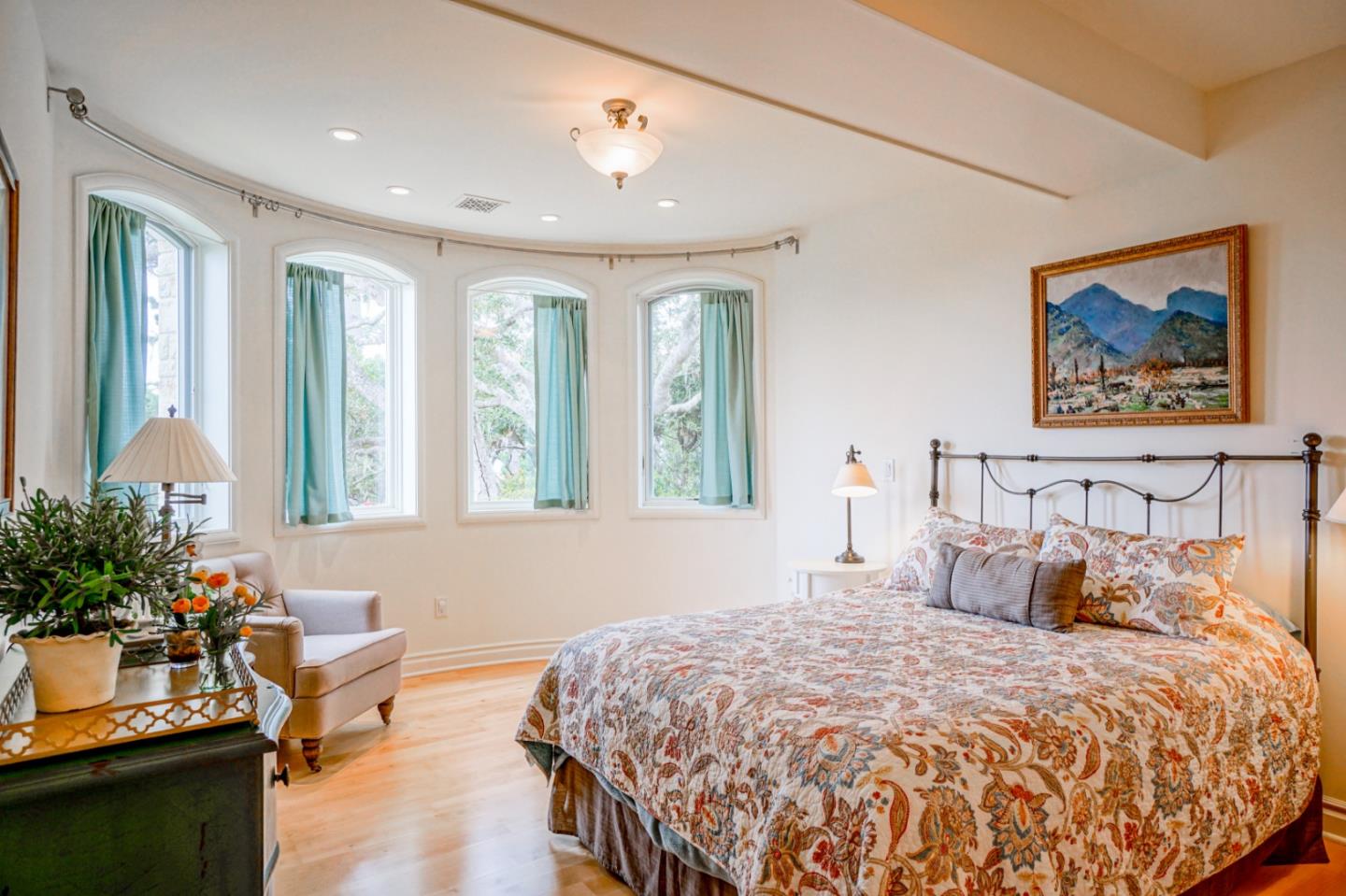 1465 Oleada Road Pebble Beach, CA 93953 - Photo 19 of 30 a bedroom with a bed and a large window
