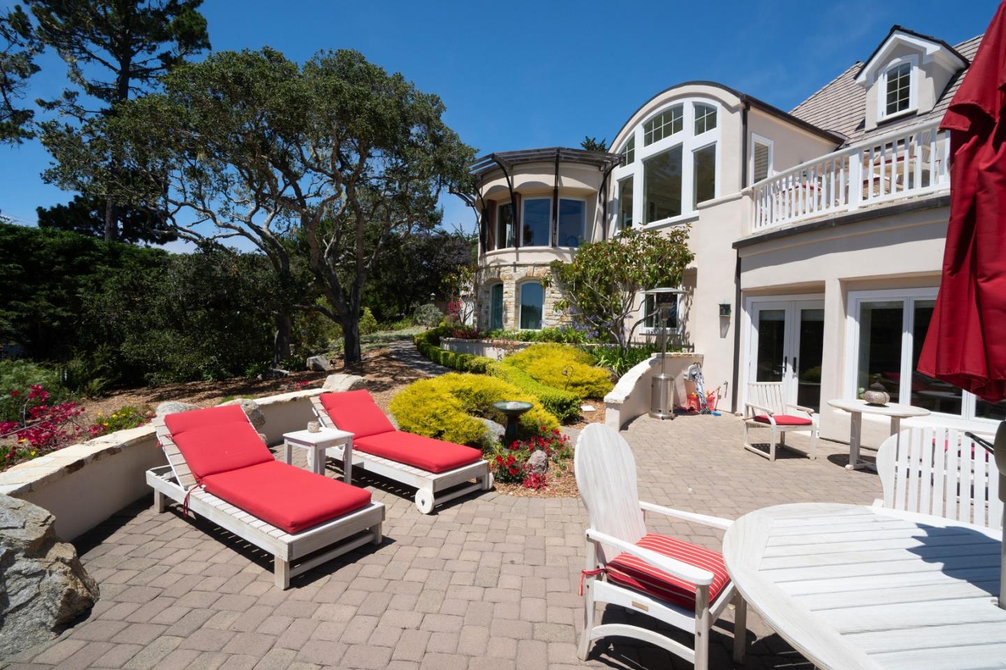 1465 Oleada Road Pebble Beach, CA 93953 - Photo 21 of 30 a view of a patio with swimming pool table and chairs