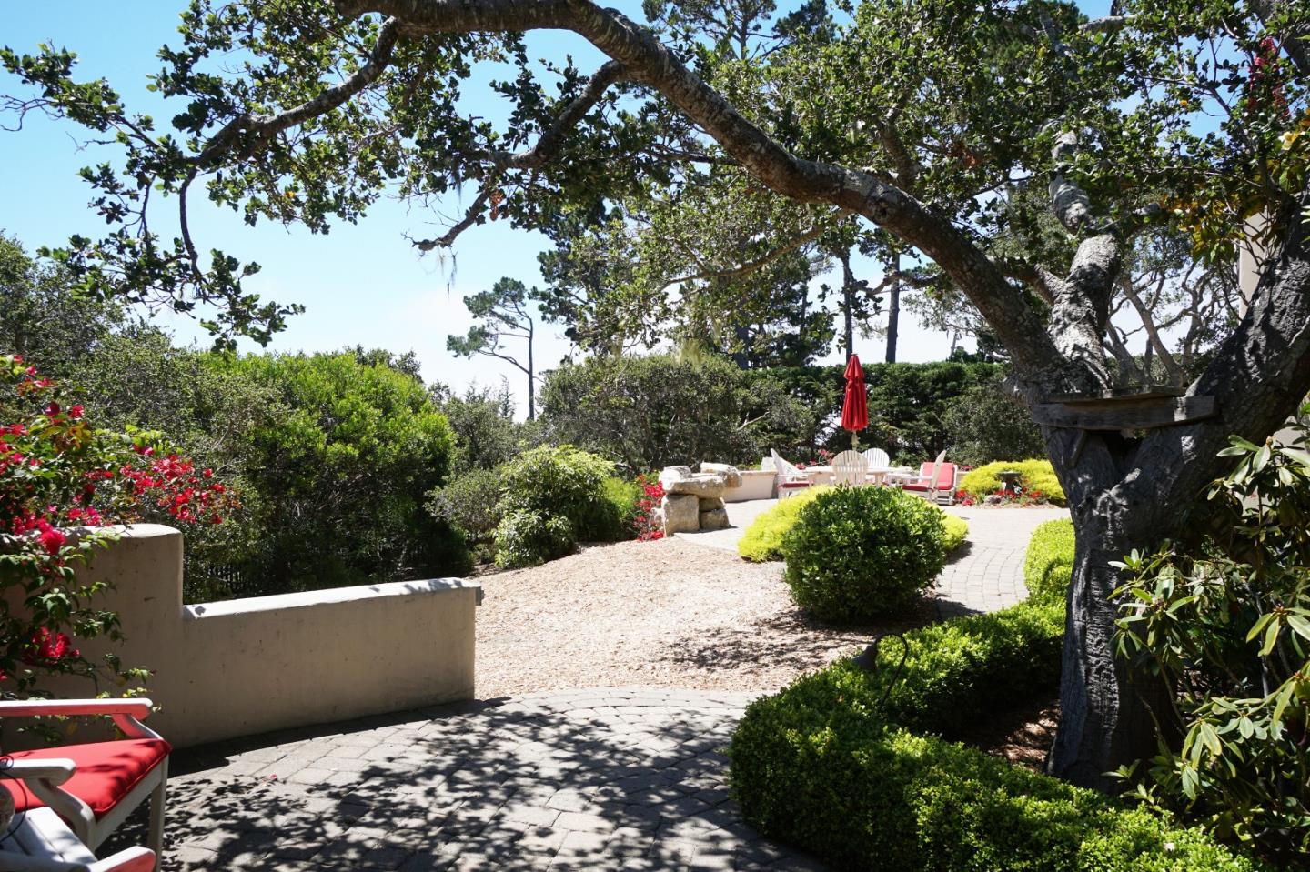 1465 Oleada Road Pebble Beach, CA 93953 - Photo 24 of 30 a view of a backyard of the house