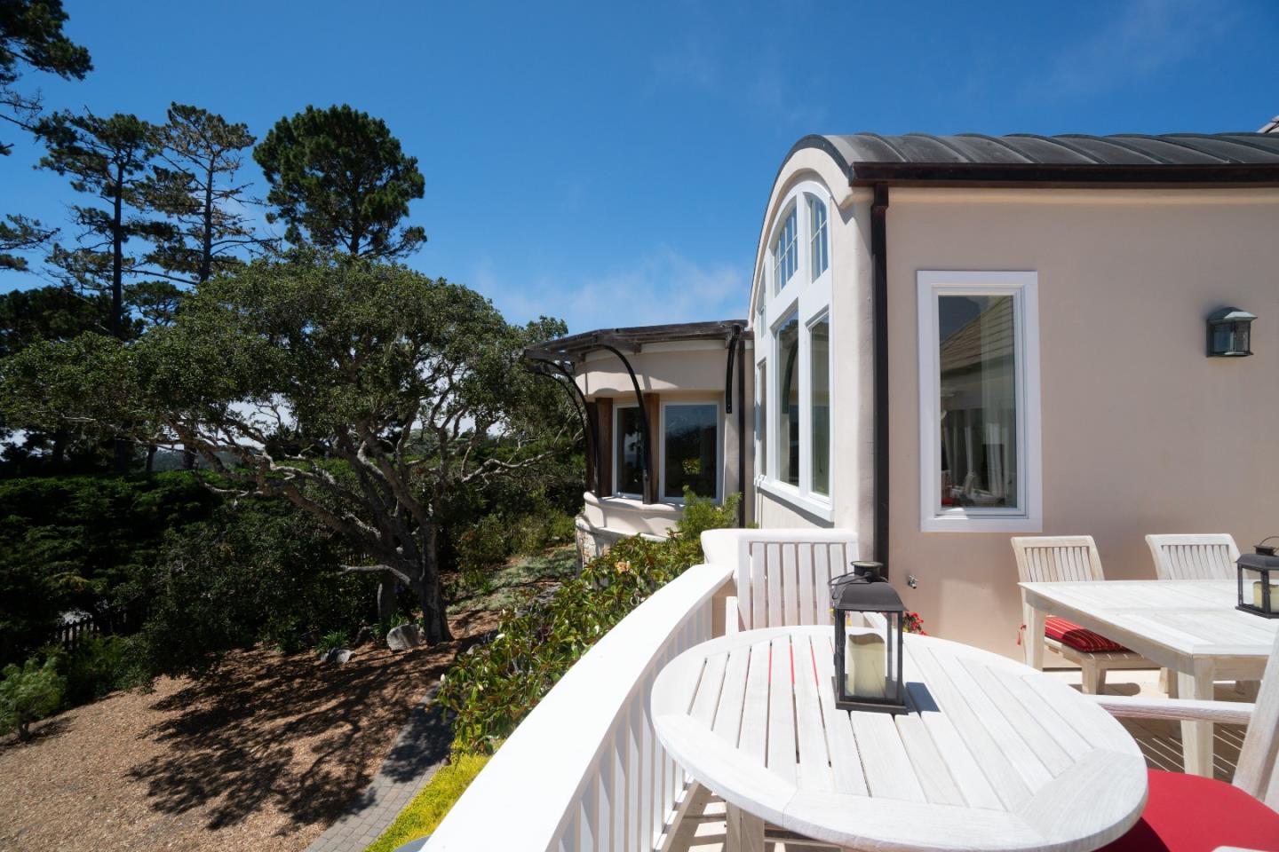 1465 Oleada Road Pebble Beach, CA 93953 - Photo 25 of 30 a front view of a house with garden