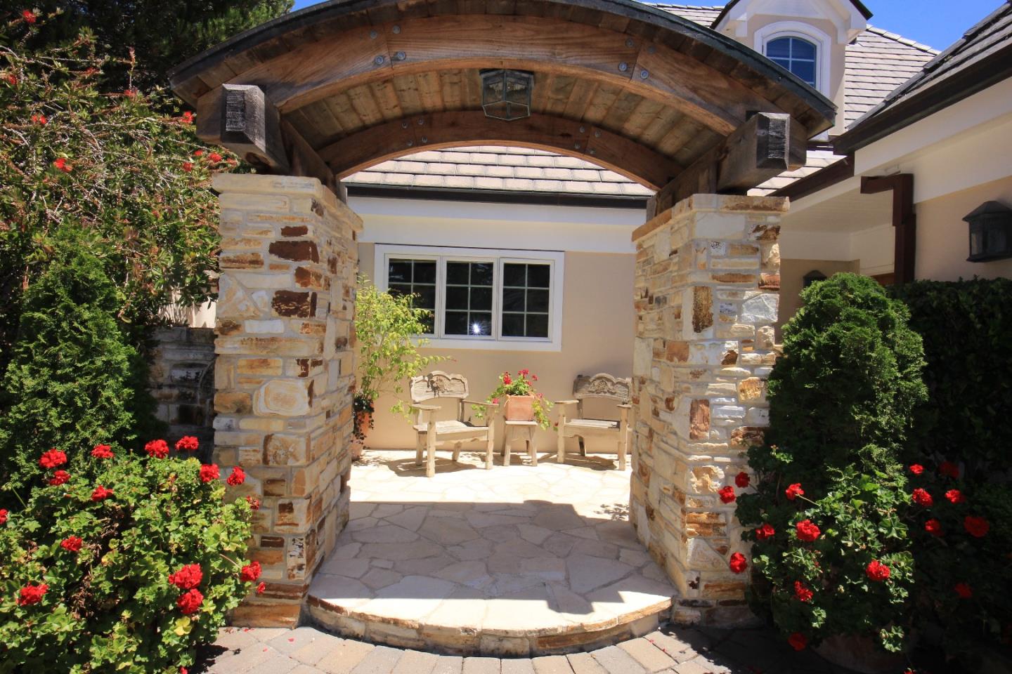1465 Oleada Road Pebble Beach, CA 93953 - Photo 3 of 30 a view of a house with a fountain