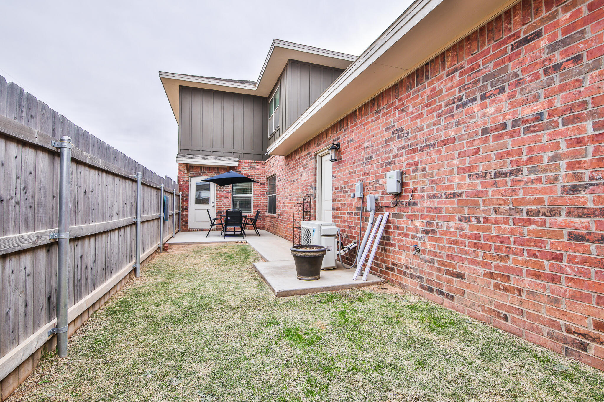 6902 20th Street Lubbock, TX 79407 - Photo 19 of 20 a view of a backyard with sitting area