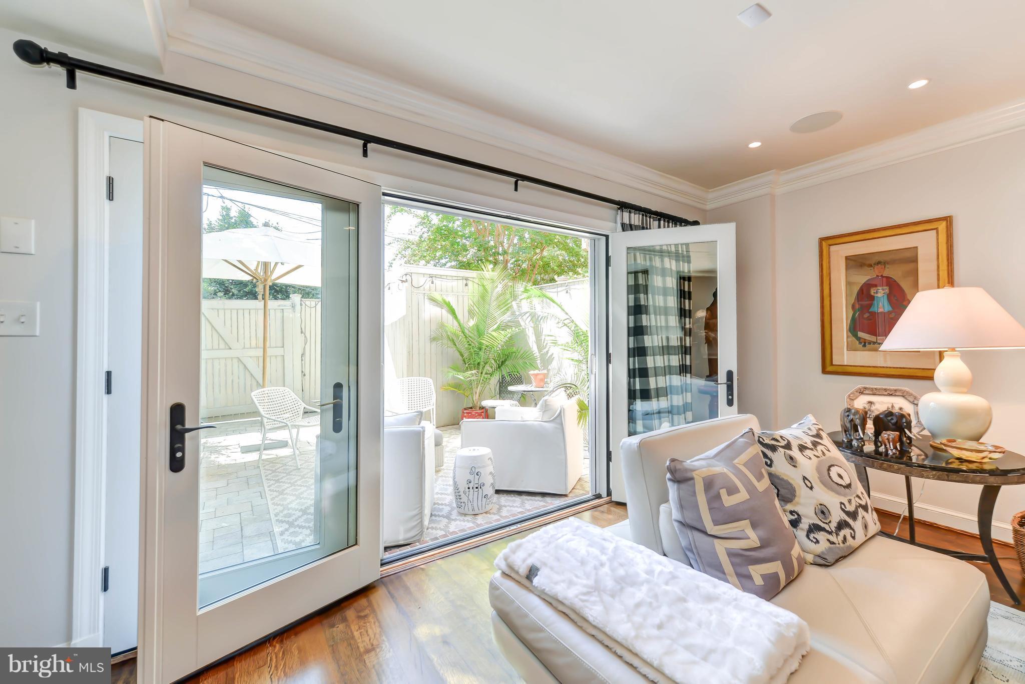 4220 River Road Northwest Washington, DC 20016 - Photo 10 of 30 Family Room opening to patio