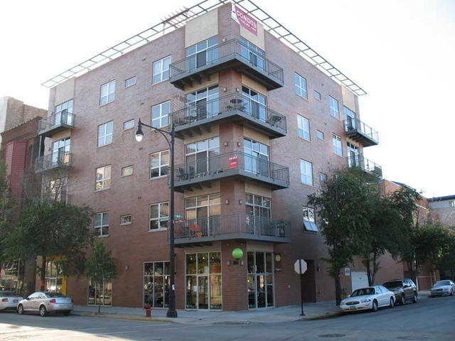 6 North May Street, Unit 201 Chicago, IL 60607 - Photo 1 of 10 a view of a building with a street