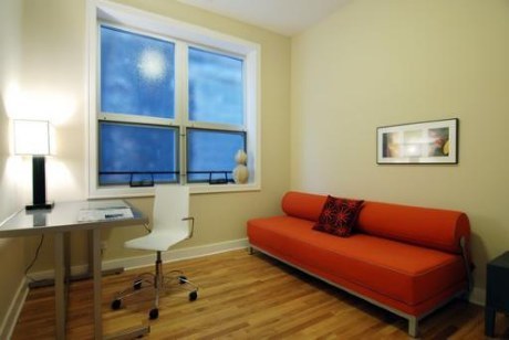 6 North May Street, Unit 201 Chicago, IL 60607 - Photo 7 of 10 a living room with furniture and a lamp