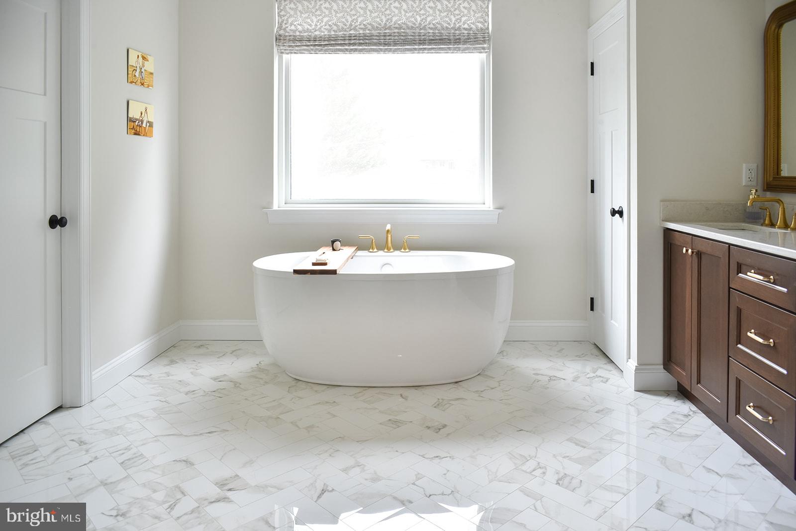3007 Coventryville Road Pottstown, PA 19465 - Photo 17 of 38 a bathroom with a tub sink and mirror