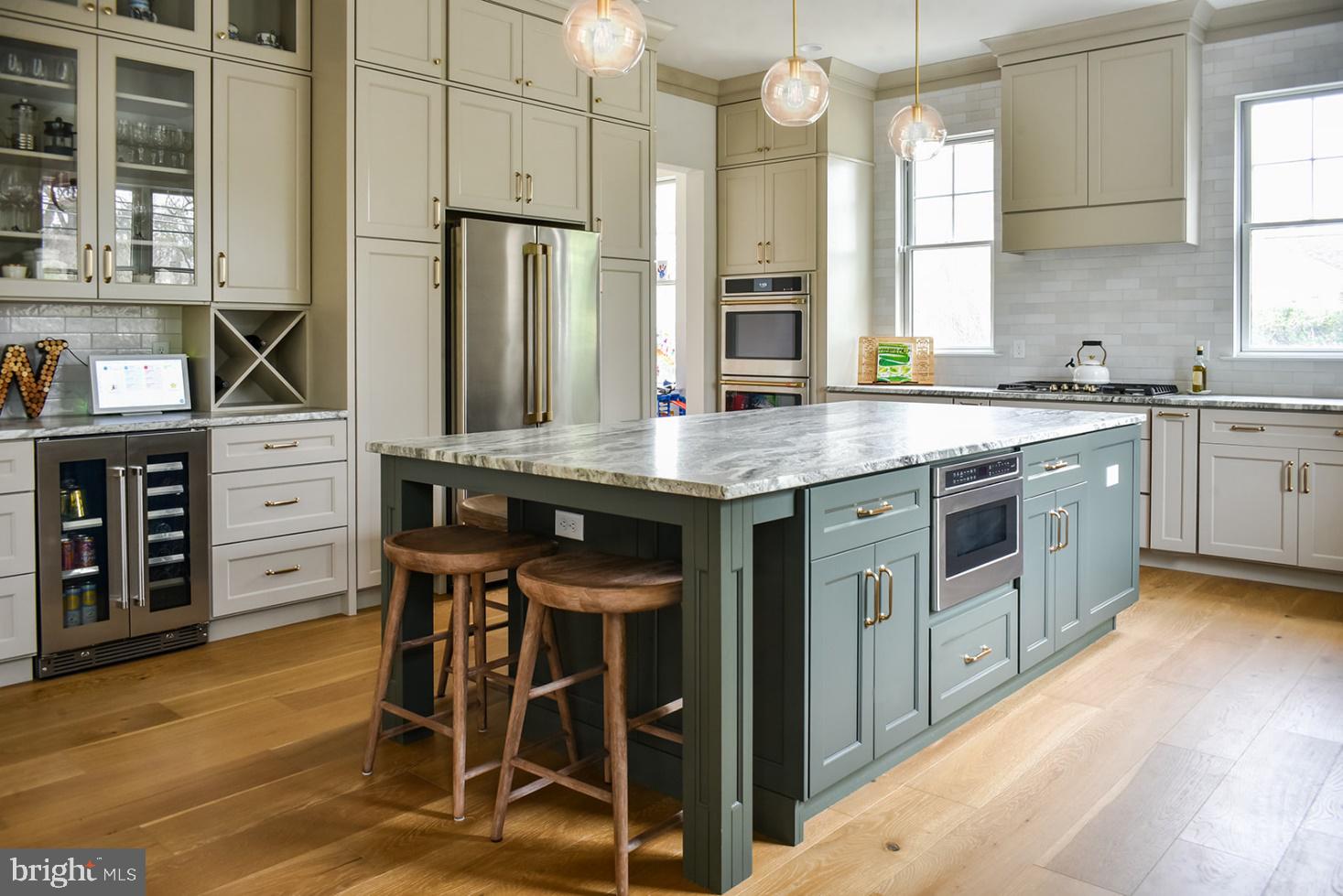 3007 Coventryville Road Pottstown, PA 19465 - Photo 5 of 38 a kitchen with stainless steel appliances granite countertop a table chairs sink and cabinets