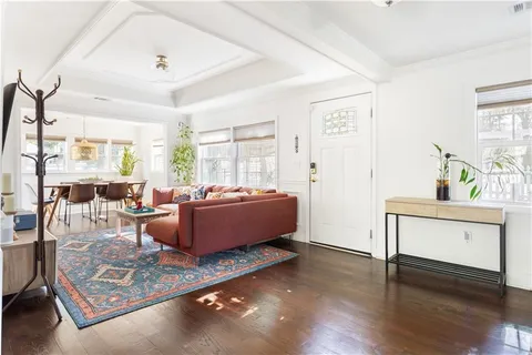 a living room with furniture and a table
