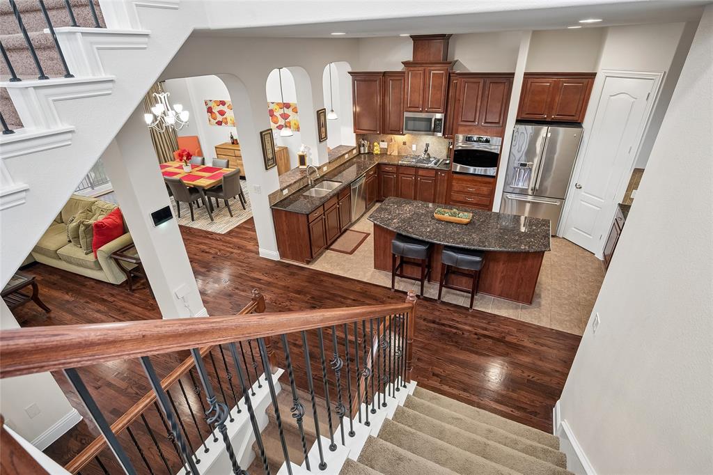 835 Rockingham Drive Irving, TX 75063 - Photo 30 of 30 When you enter the home, this grand view of the open floorplan greets you.