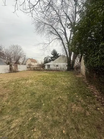 a view of a yard with an outdoor space