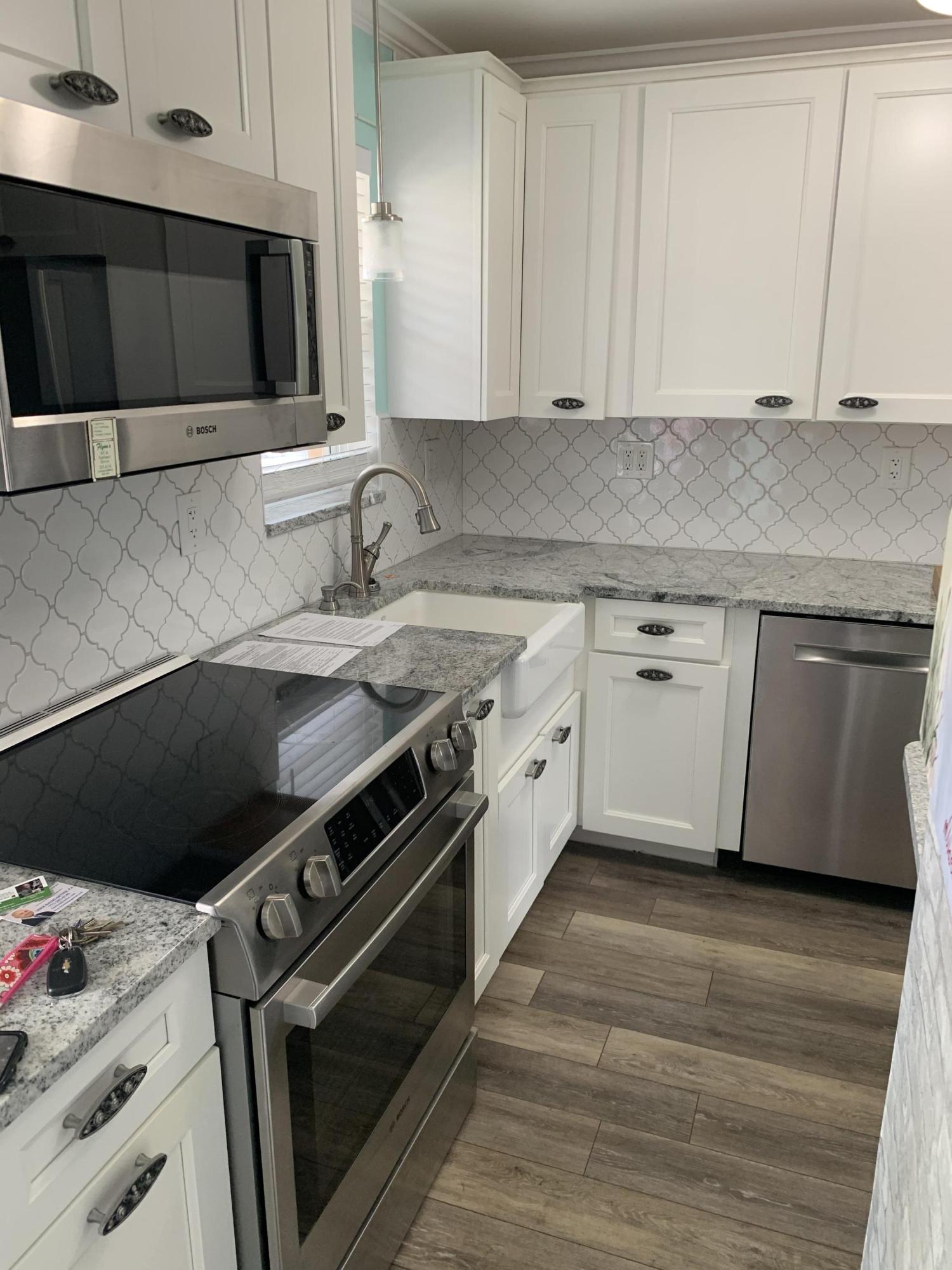 1971 Southwest Palm City Road, Unit 36I Stuart, FL 34994 - Photo 1 of 7 IMG_5518